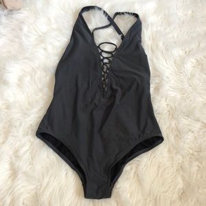 Micheal Kors gray lace up cross back one piece 10